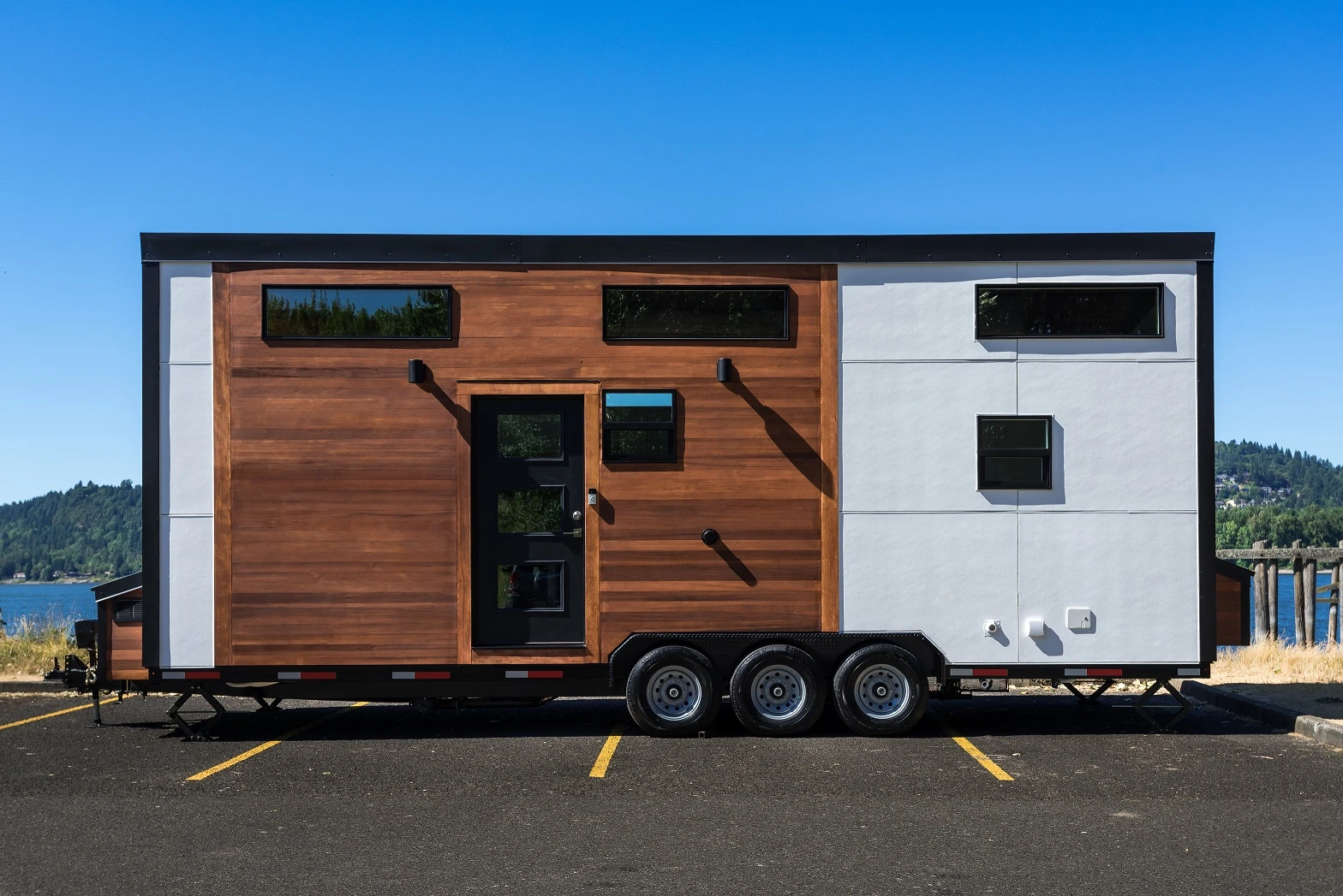 The Catalina is wrapped in board and batten or lap siding, with knotty cedar tongue and groove accenting