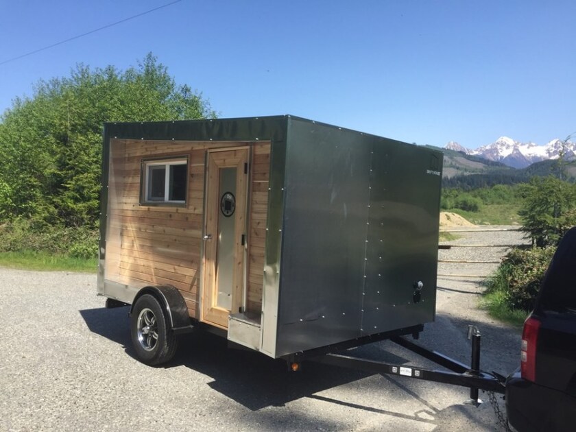 Part tiny house, part camping trailer