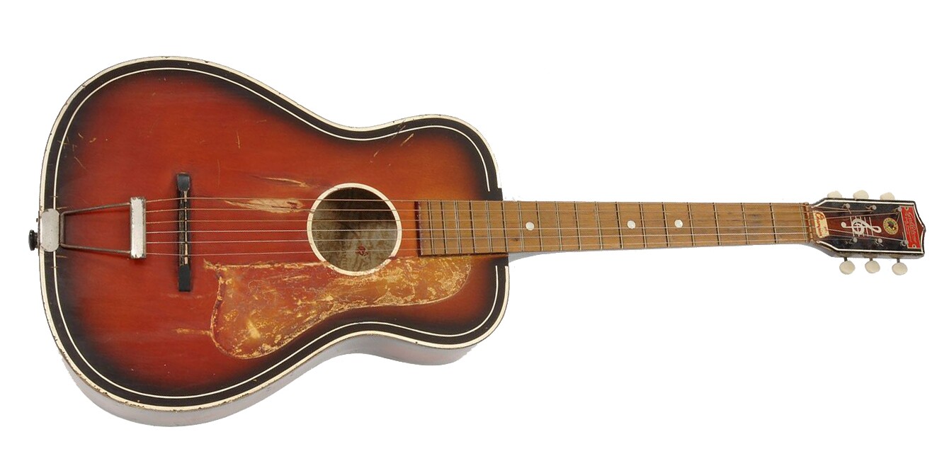The 3/4 size guitar John Lennon was playing on that auspicious day when the world's most famous songwriting duo met. It "broke" in 1958 and was left in the care of Lennon’s Aunt Mimi, who, on his death, and after getting the guitar repaired, gave it to a disabled boy and when he died it was passed on to a disabled girl. The guitar was auctioned in 1999 with the proceeds going to safeguard her future. The guitar was auctioned bearing a brass plaque which Lennon's Aunt Mimi had mounted on the headstock with the advice she once gave to a young Lennon: "Remember, you'll never earn your living by it." It sold ion 14 September, 1999 at a Sotheby’s auction for $244,384 (£155,000)
