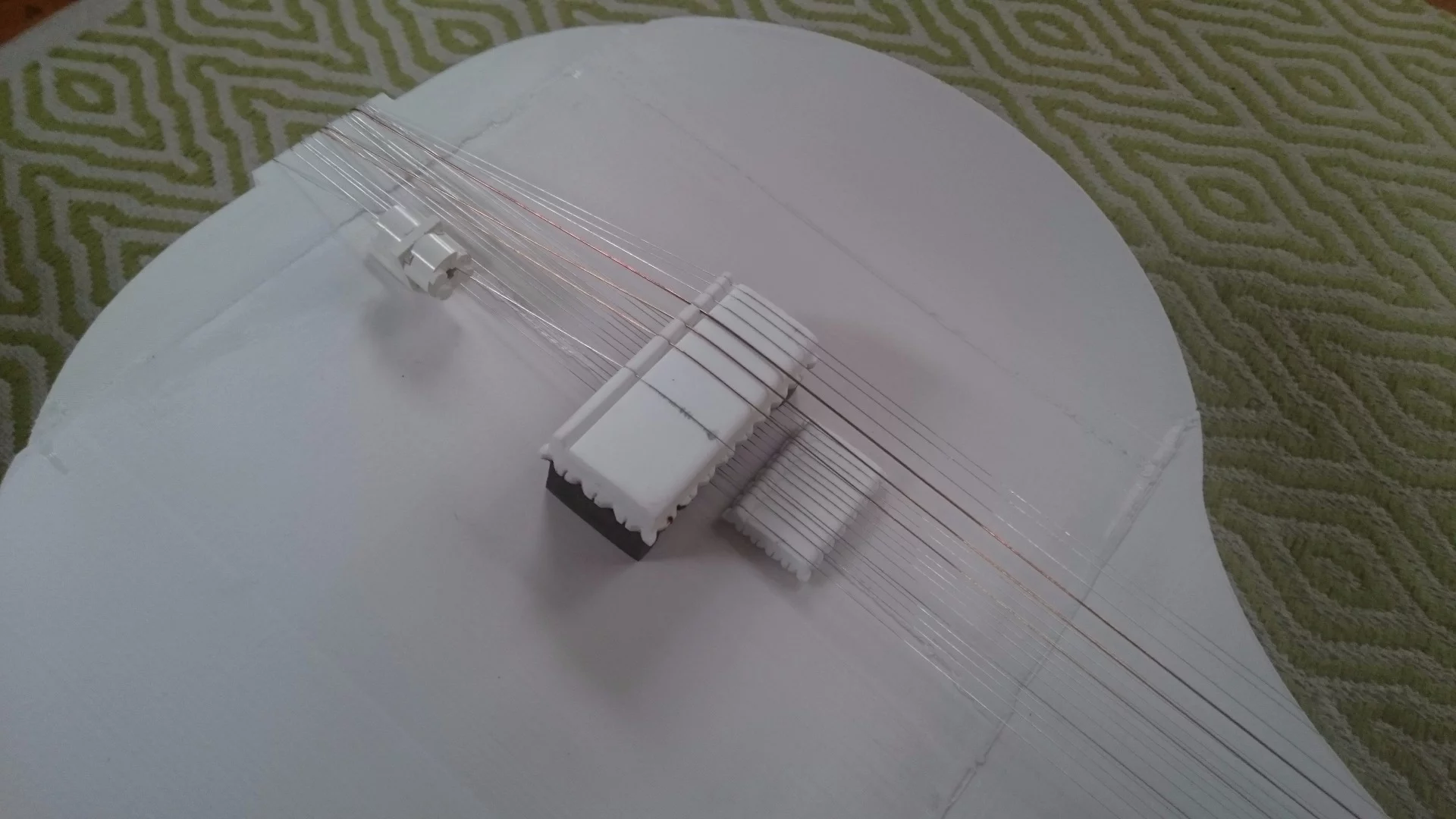 A standard bridge was used to help create the distinctive sound of the sitar