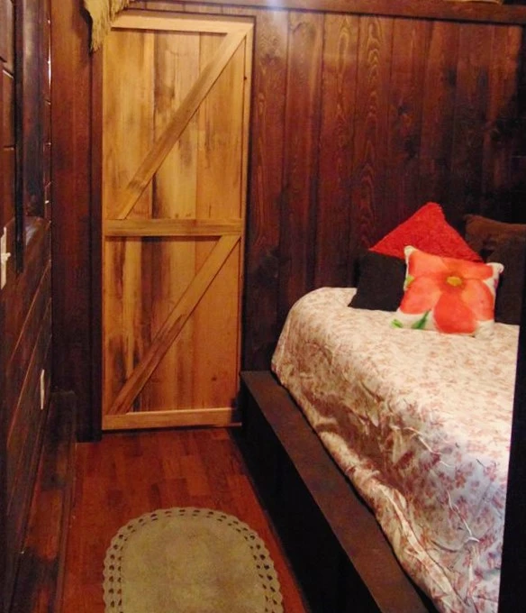A sliding door provides access to the bathroom