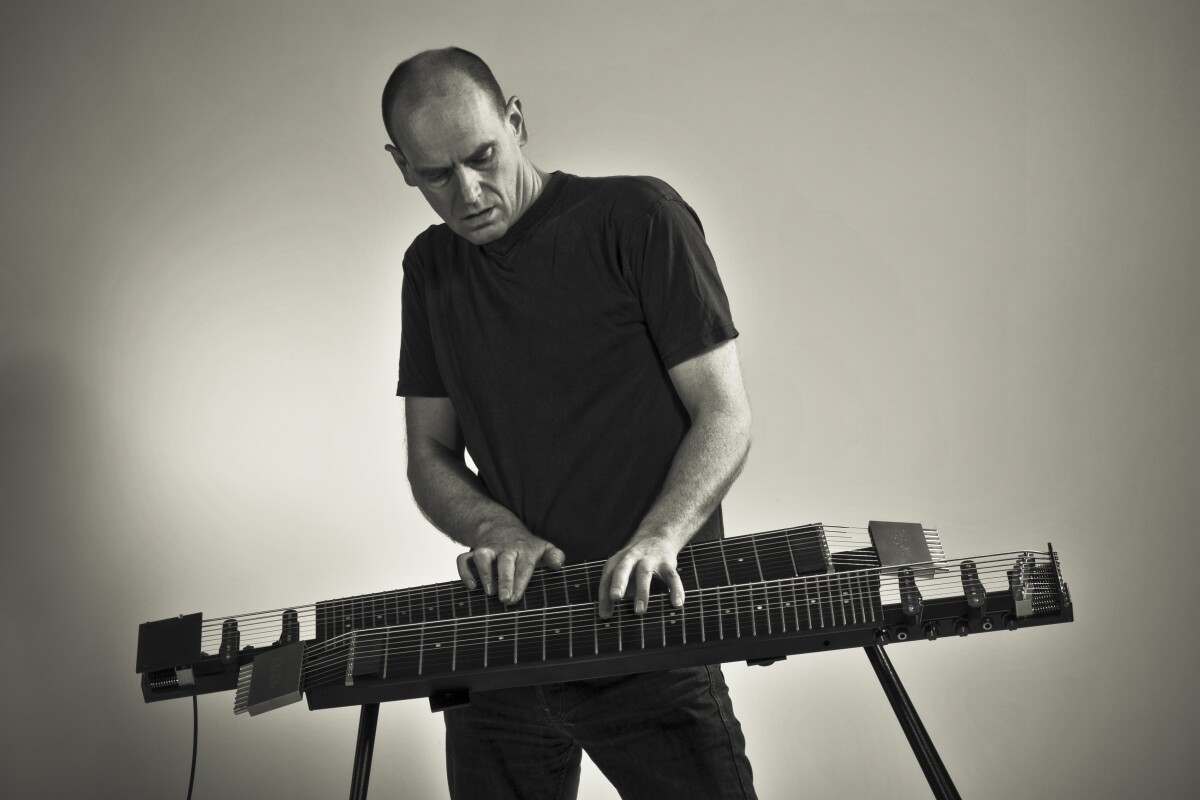 The Kelstone 9-string instrument can be played using both hands, like a piano