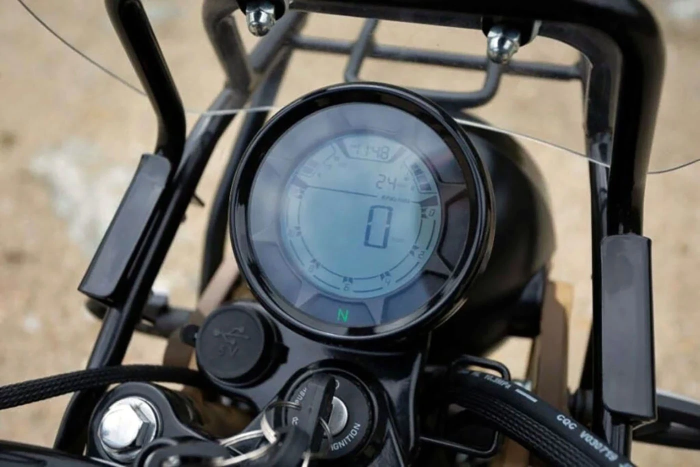 The digital tach and speedo look sleek and robust – there's a USB port that comes standard just to the left of the key