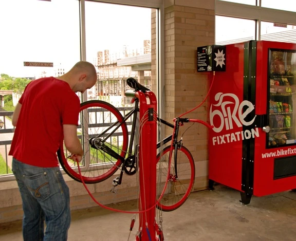The Bike Fixtation universal bike repair stand includes a set of tethered bike tools and there's a self-contained tire inflator nearby