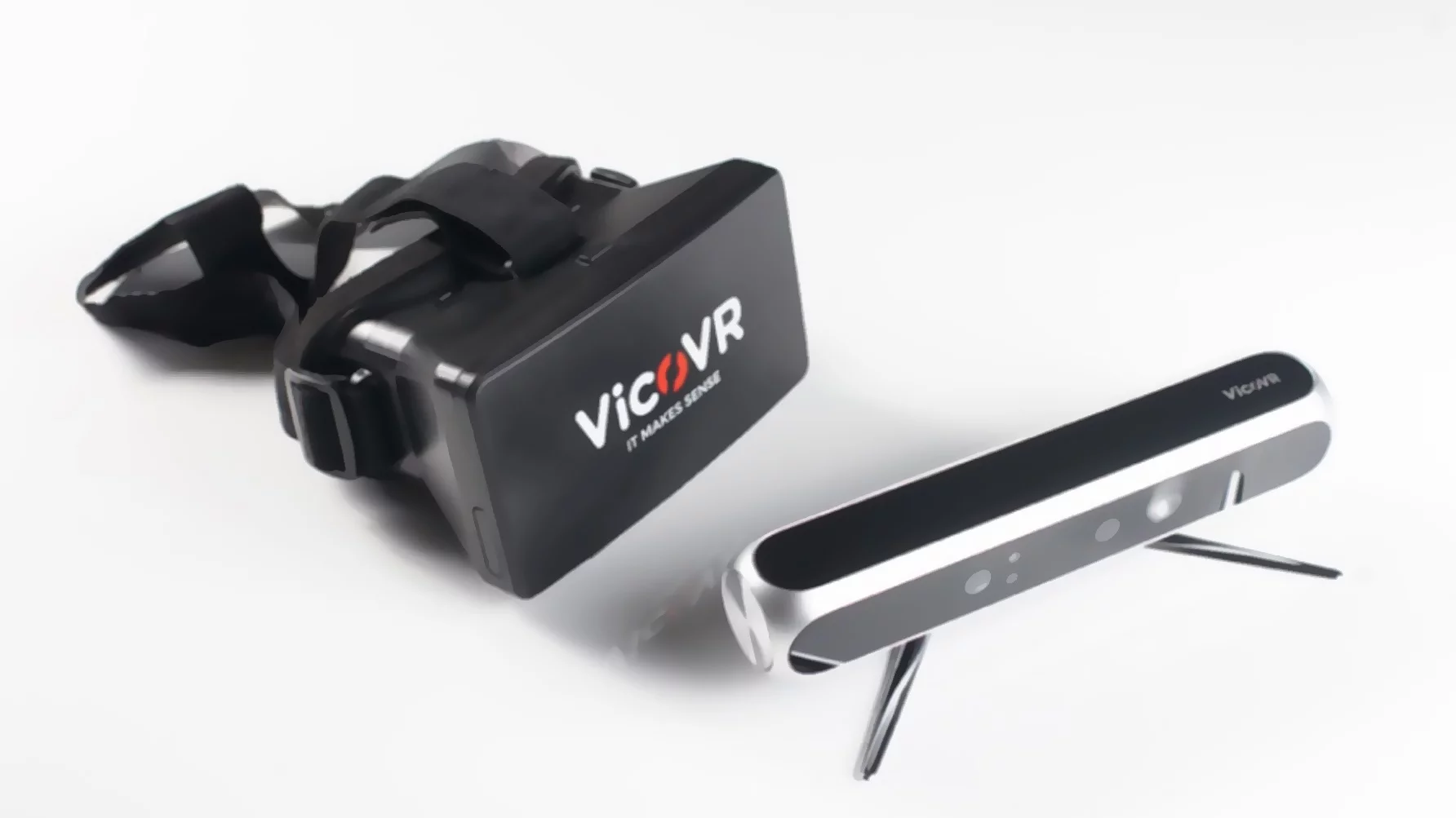 Two parts of the VicoVR system, with headset and sensor