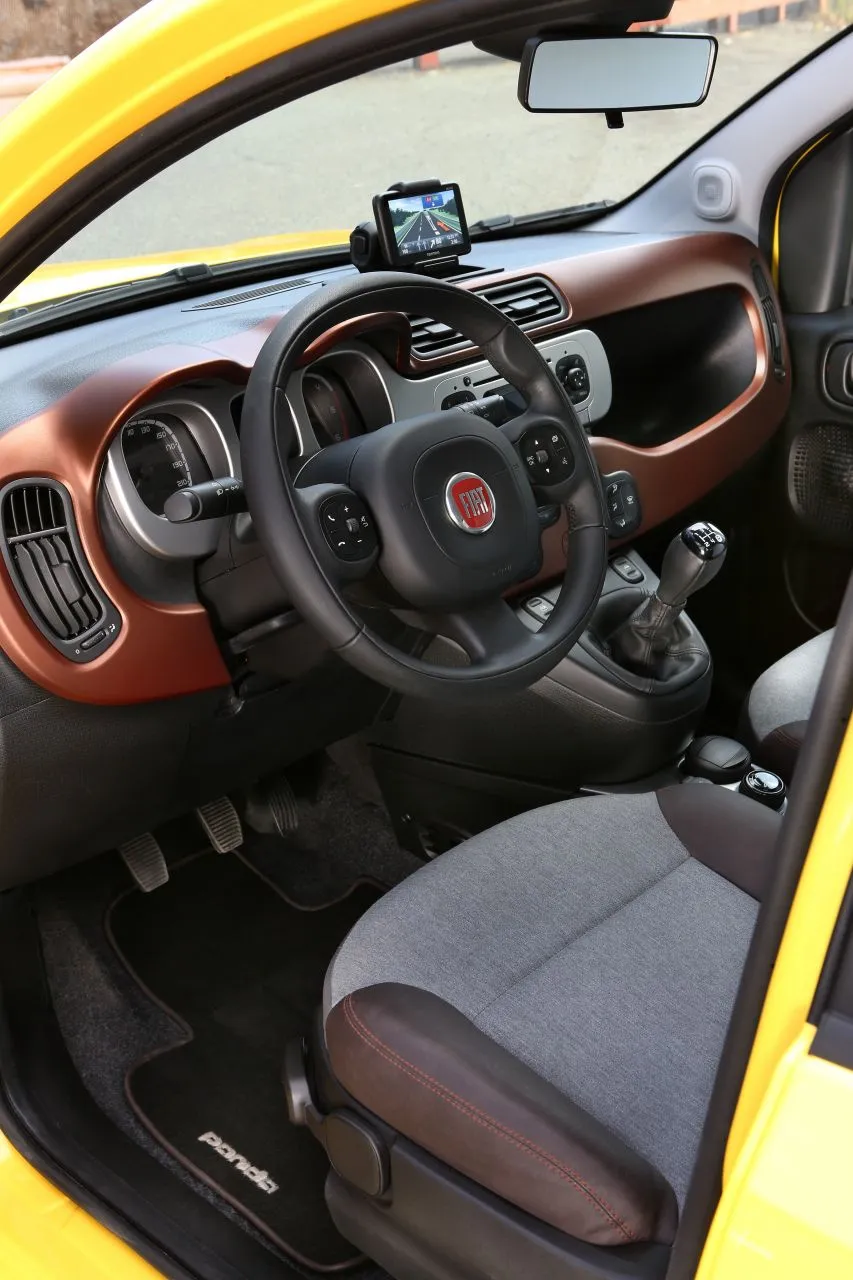 The Panda's interior is finished in copper to contrast the "ultrashine" multimedia system