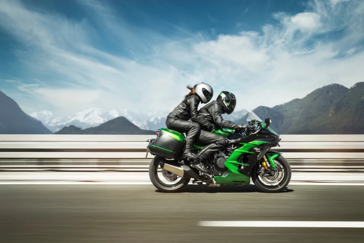 The 2018 Kawasaki H2 SX in two-up action