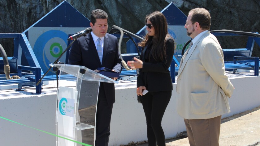 Gibraltar's Prime Minister Fabian Picardo said some brief words about the significance of the occasion, before hitting the button that sent the buoys crashing down into the calm waters below