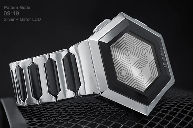 The mirrored display and silver strap offer simplicity to counter the mindbending animation