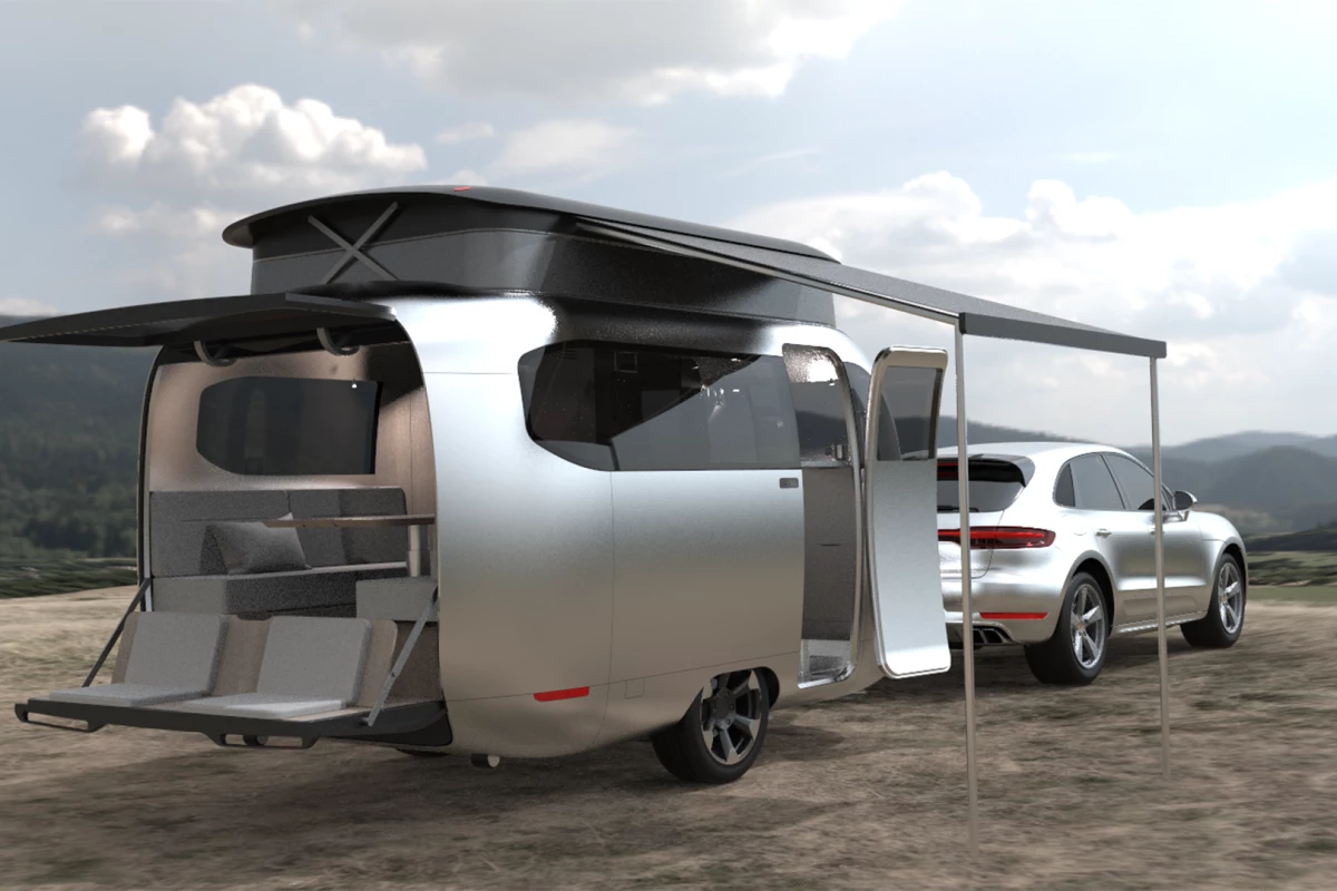 The Airstream x Porsche concept trailer brings the outdoors in with a panoramic window design, large skylight and open rear deck