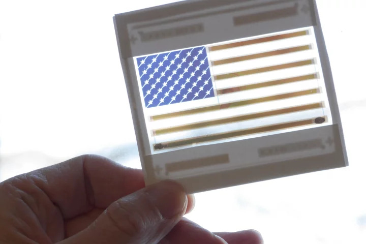 This colorful American flag is in reality a functional and transparent solar cell (Photo: Joseph Xu, Michigan Engineering Communications & Marketing)