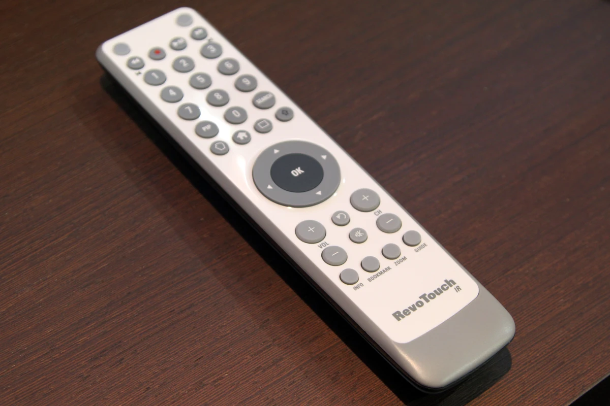An IR remote control prototype with RevoTouch technology that turns the circular directional and OK buttons acting into a touchpad