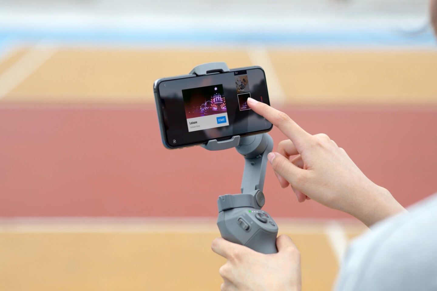 The Osmo Mobile 3 is used with the DJI Mino app running on the docked smartphone