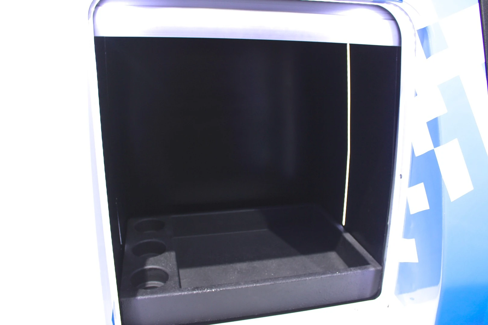 The Ford/Postmates research vehicle has a variety of compartments for storing deliveries