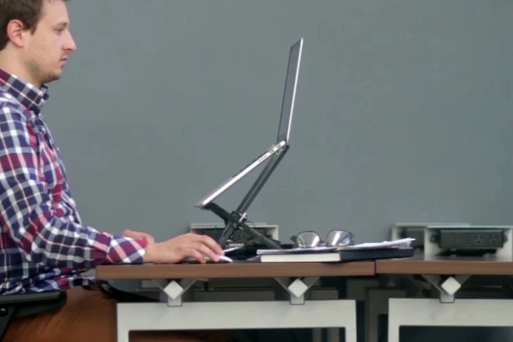 When fully extended, The Roost lifts the top of a 13-inch MacBook Air screen to 19.25 inches (48.9 cm) above the table