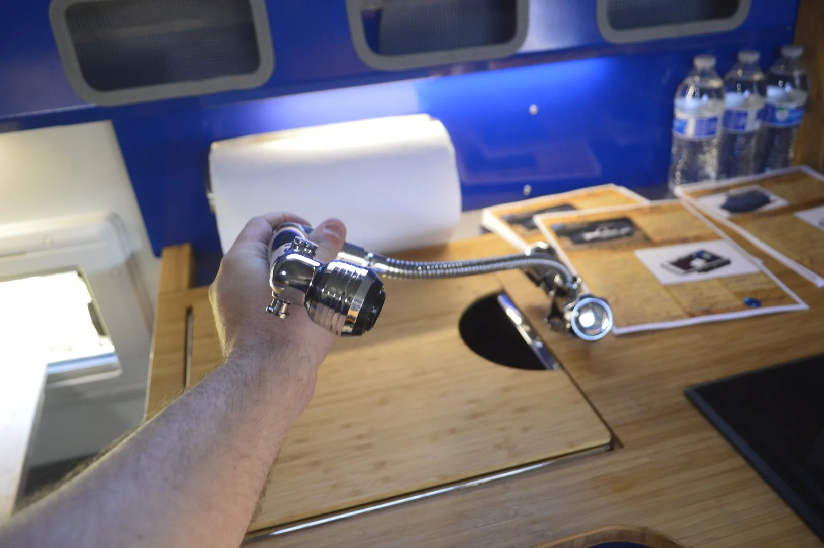 The faucet pulls out and works as a shower, a smoother design than the separate faucet/shower hookup on the original GZL prototype