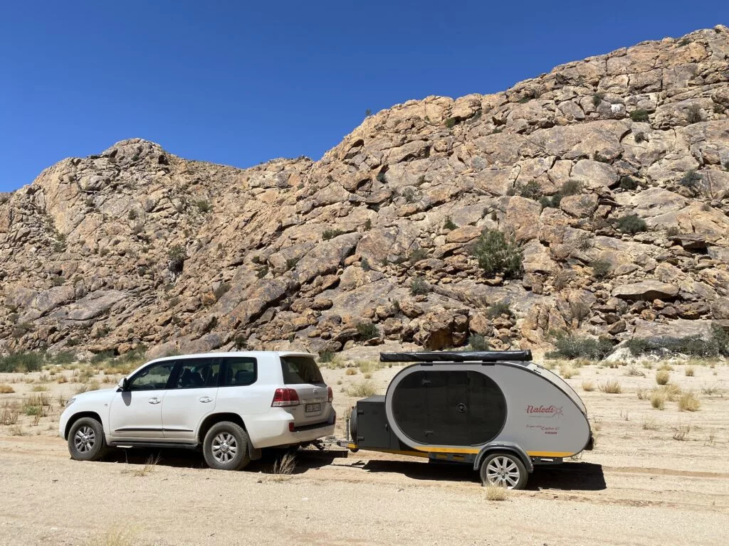 The Naledi Camper comes with an awning on each side, and one includes drop-down privacy sides