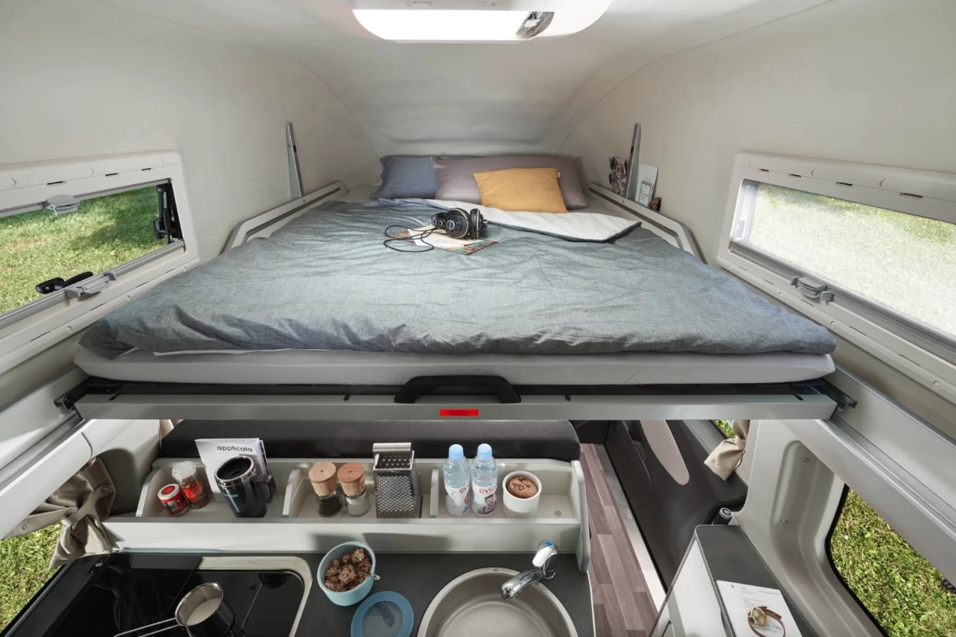 The last-generation long-wheelbase high-roof Nugget featured a double bed in the roof that retracted forward out of the way during the day for more headroom below