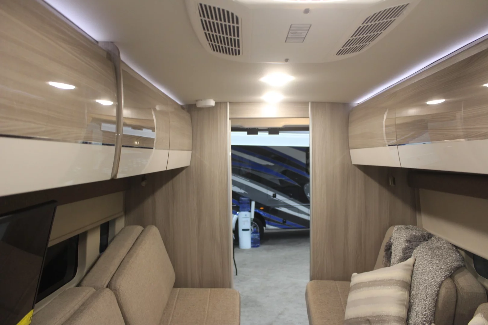 Those glossy curved-face upper cabinets come from Italian company Tecnoform