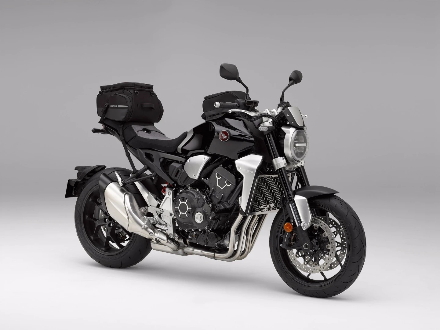 The 2018 Honda CB1000R+ is a standard model with a lot of factory-fit original equipment