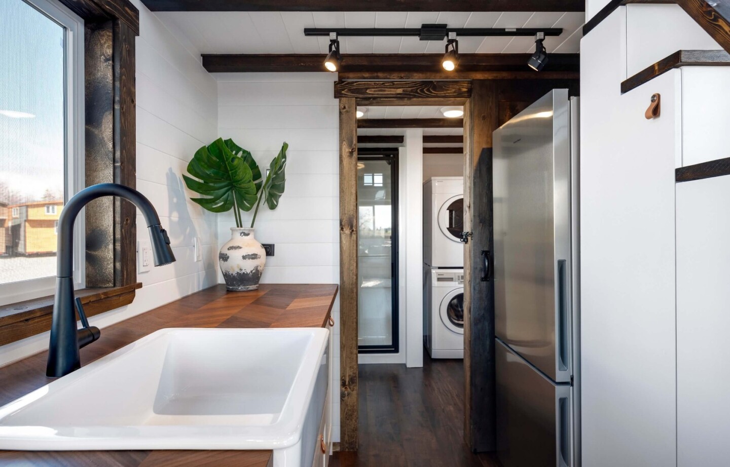 The Napa Editions feature a custom European wall kitchen, complete with butcher block veneer countertops