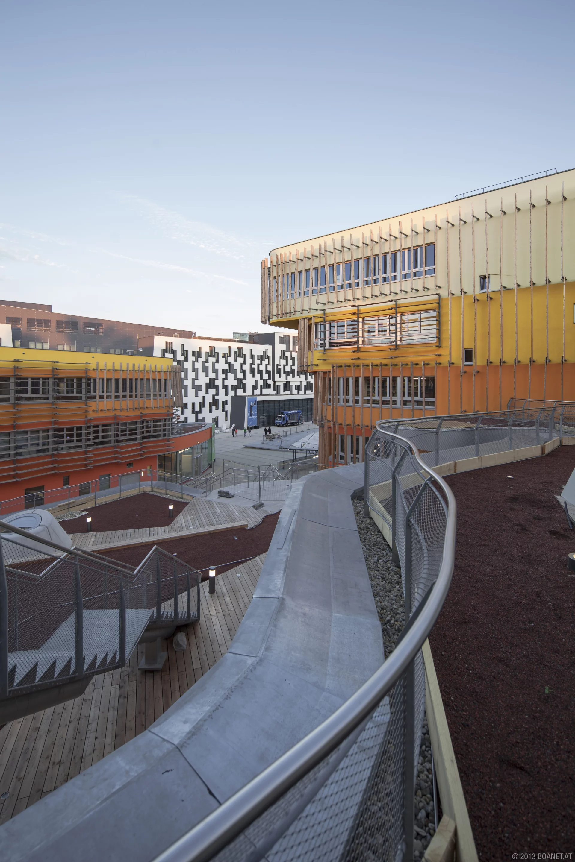 The building by London's CRAB studio features open walk ways and tiers of plaza space (Image: Campus WU/boanet)
