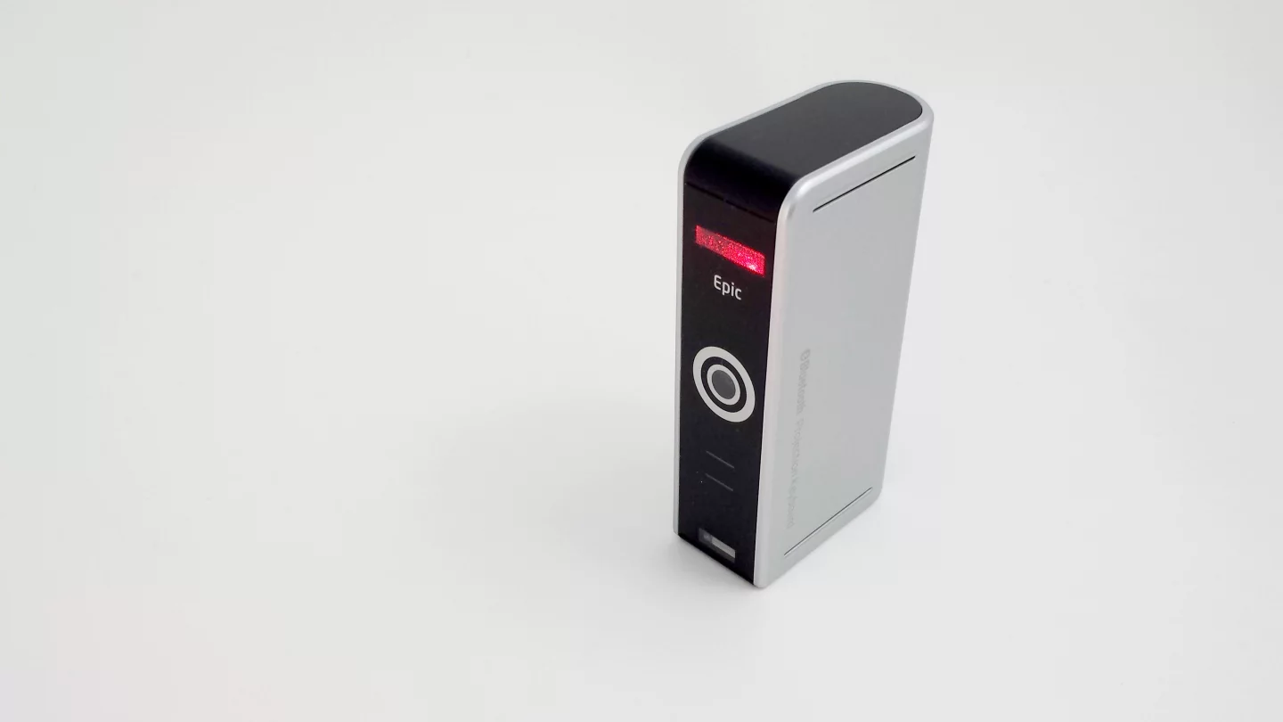 The Epic projects the keyboard from the top of the device, and senses keystrokes via infrared at the bottom of the device