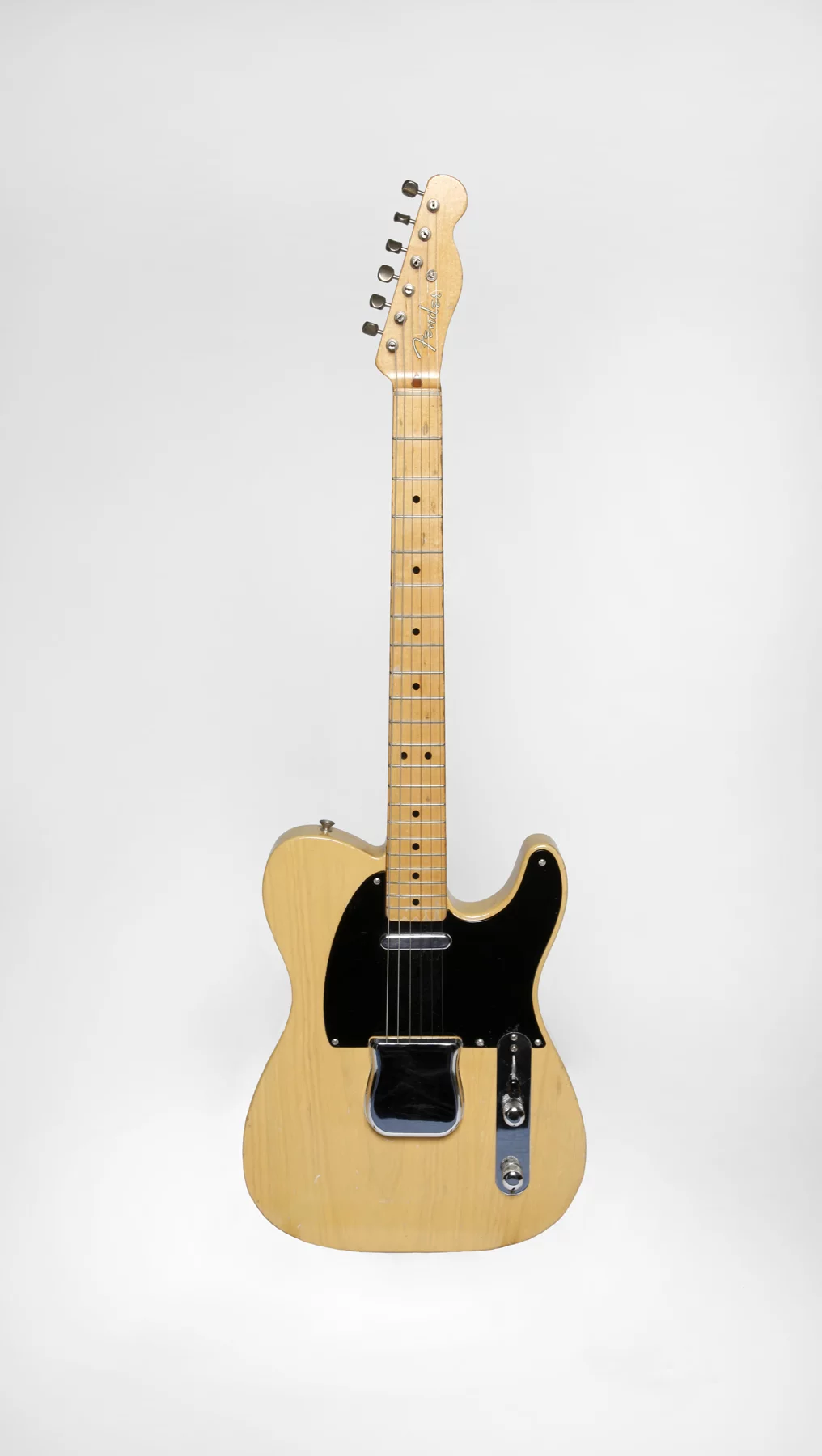 The butterscotch 1951 Fender Nocaster with its original thermometer case that was a gift to Les Paul from Leo Fender