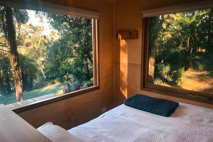 The Zinc Studio Cabin's bedroom includes a double bed and has ample headroom to stand upright