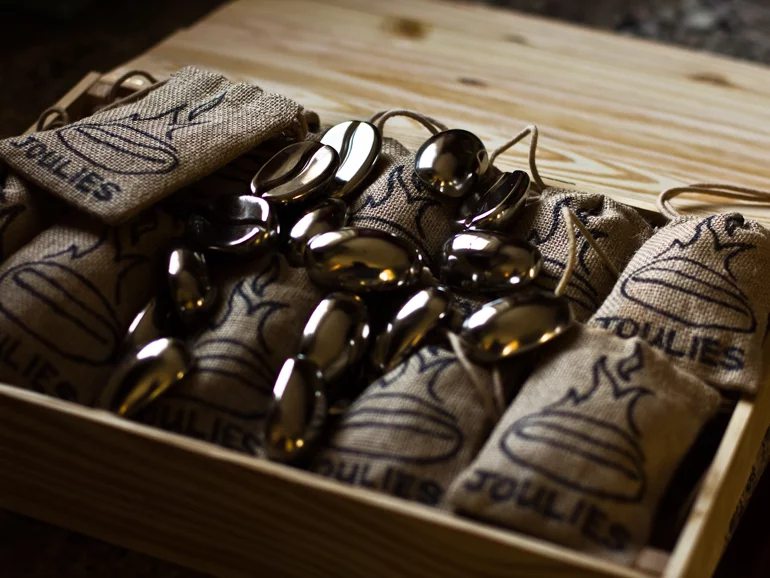 Coffee Joulies incorporate a phase change material to quickly cool your hot coffee to the "perfect" temperature, and then keep it there