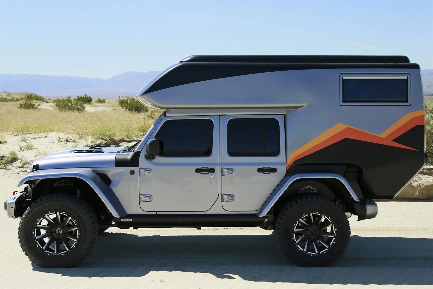 While the X4 lacks some of the interior space and amenities of the X2, owning to its shorter fiberglass cabin, it appears to sit at about the same length while providing belted seats and sleeping berths for four people