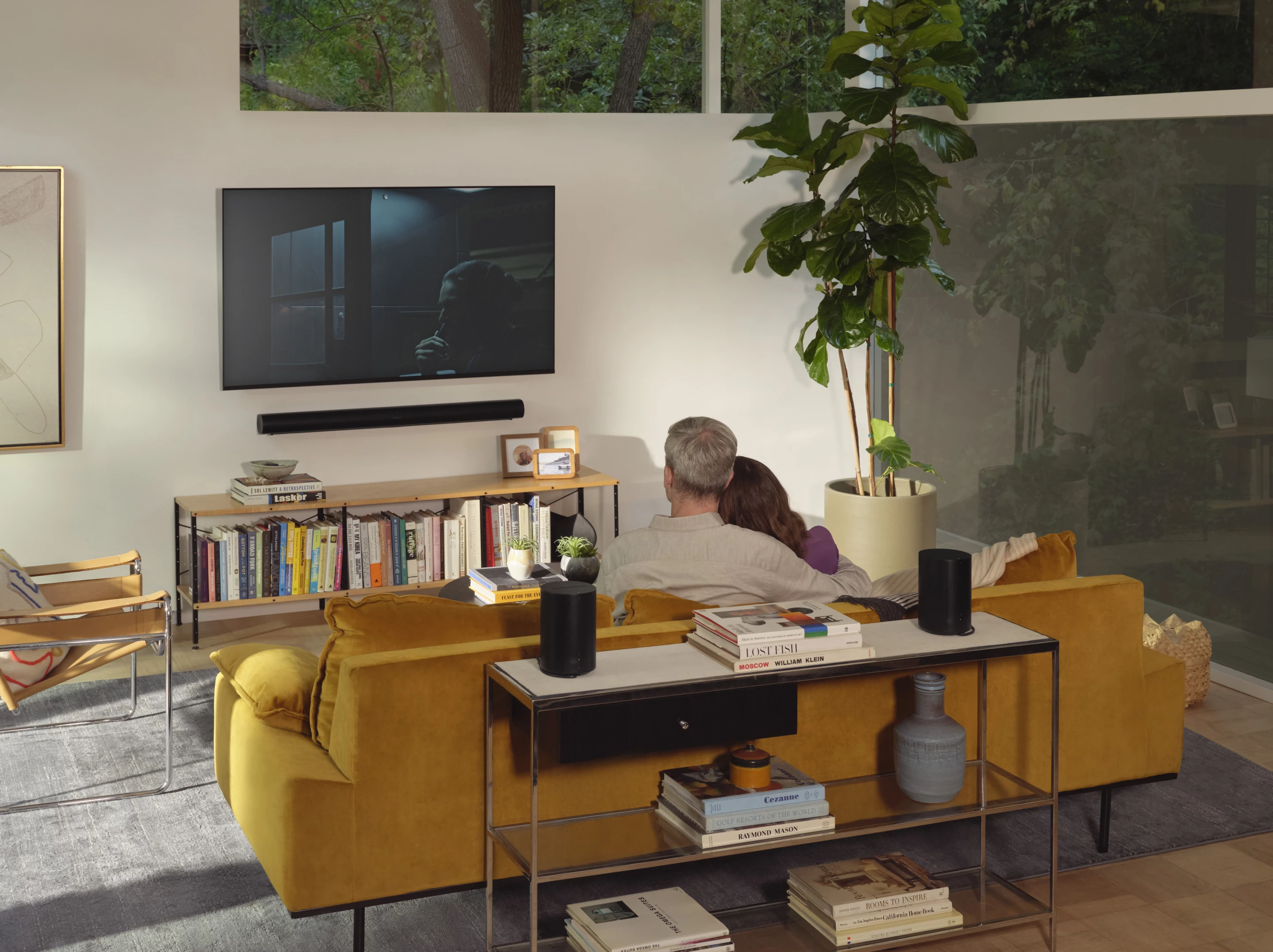 A pair of Era 100 speakers can be used with a Sonos soundbar in a home theater setup