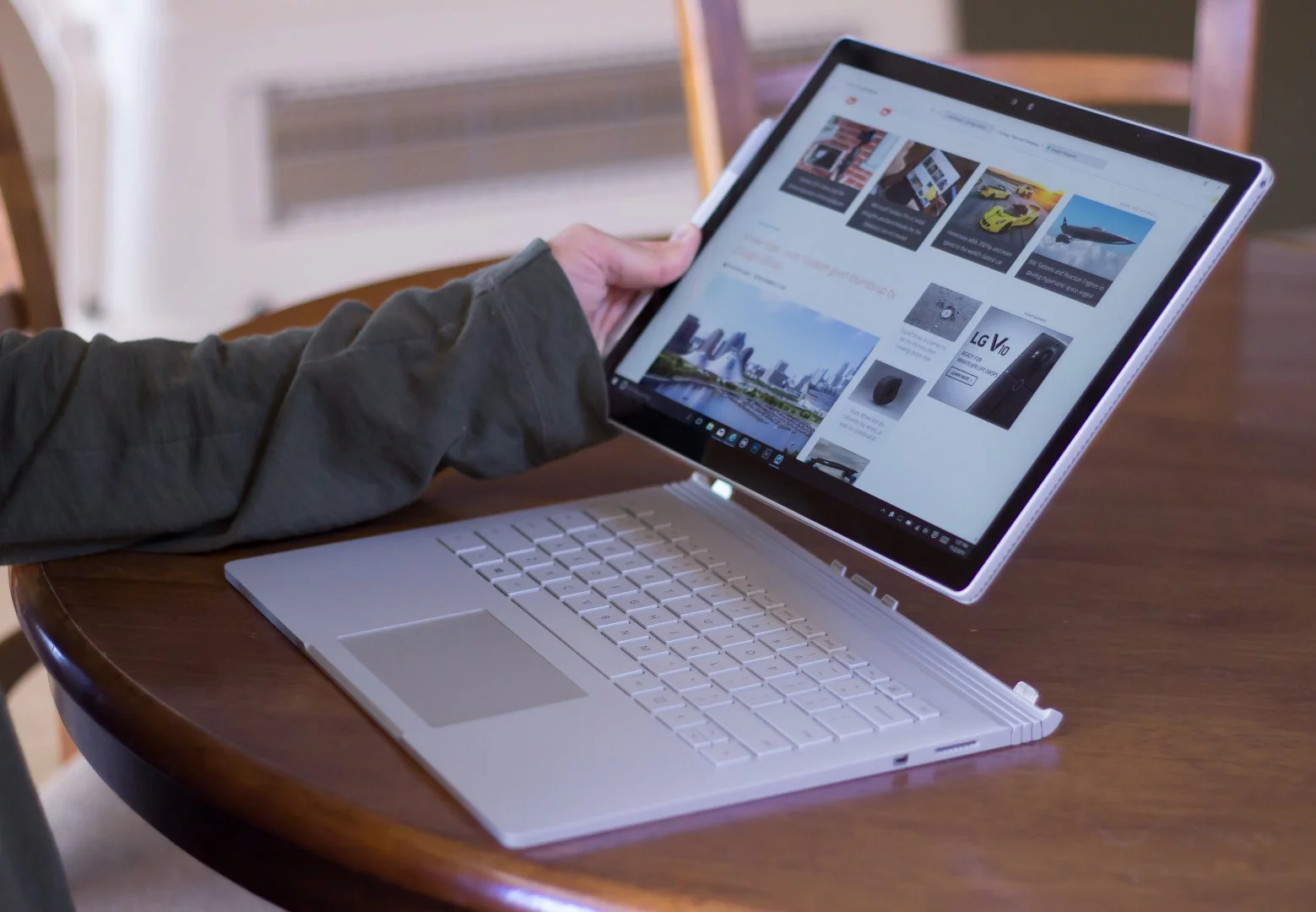 Since the bigger battery is in the keyboard, the Surface Book feels very light (for its size) in tablet mode