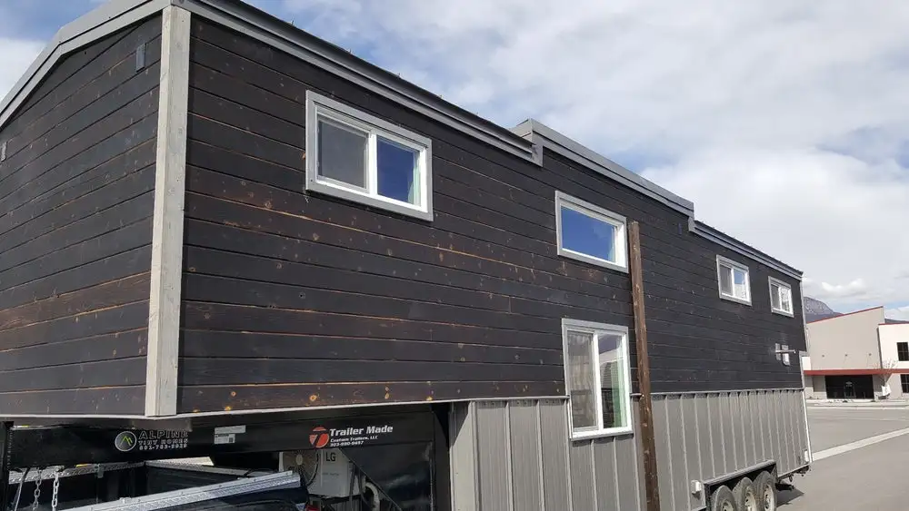 The Tiny Giant sports an attractive Shou Sugi Ban exterior