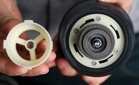 The Kuissential EvenGrind coffee grinder has a removable cage that stabilizes the burr