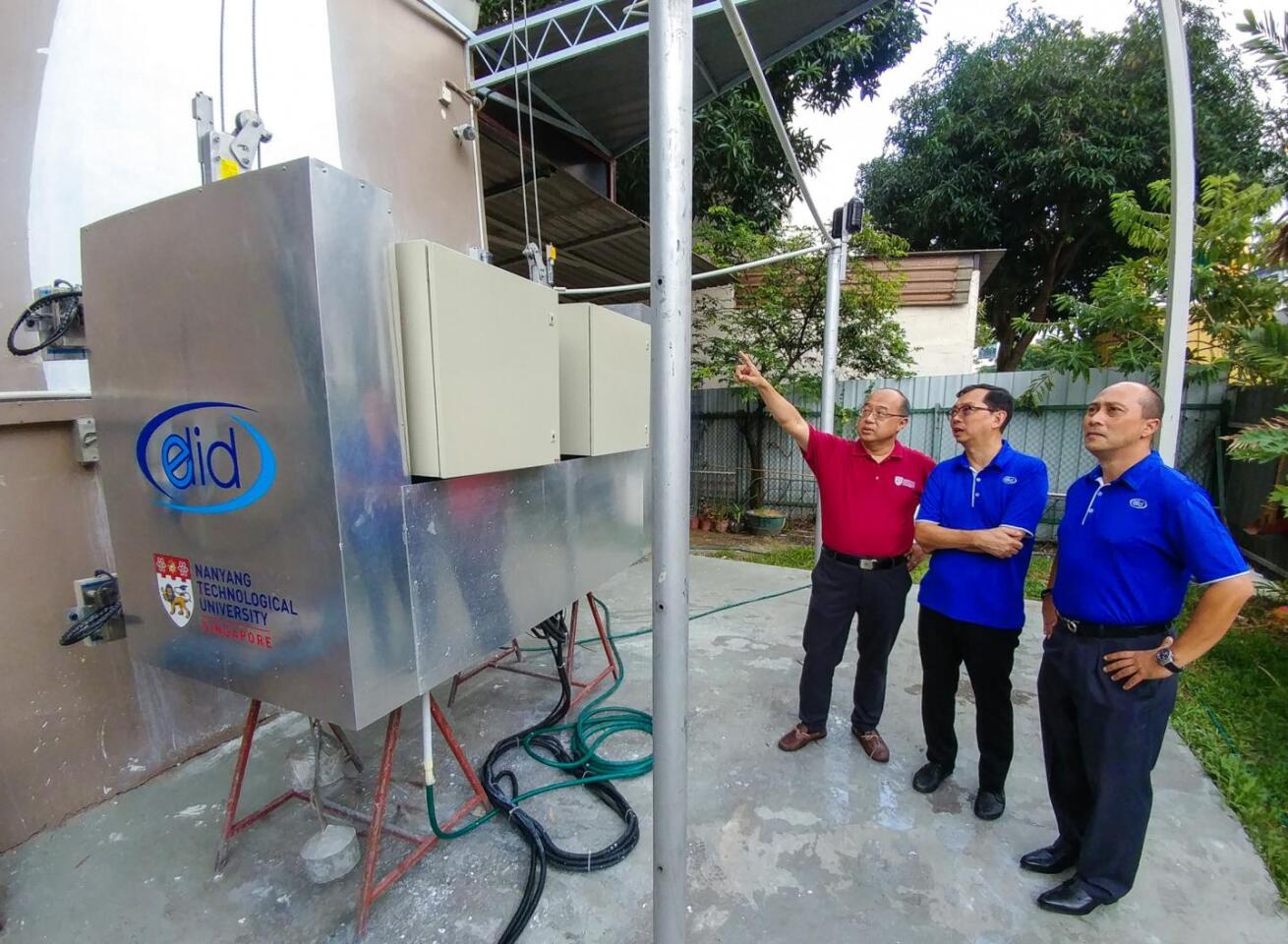 (From left) NTU Professor Chen I-Ming, ELID Group Managing Director Dennis Lim and ELID Vice President Kenneth Wong at the launch of the OutoBot in Singapore
