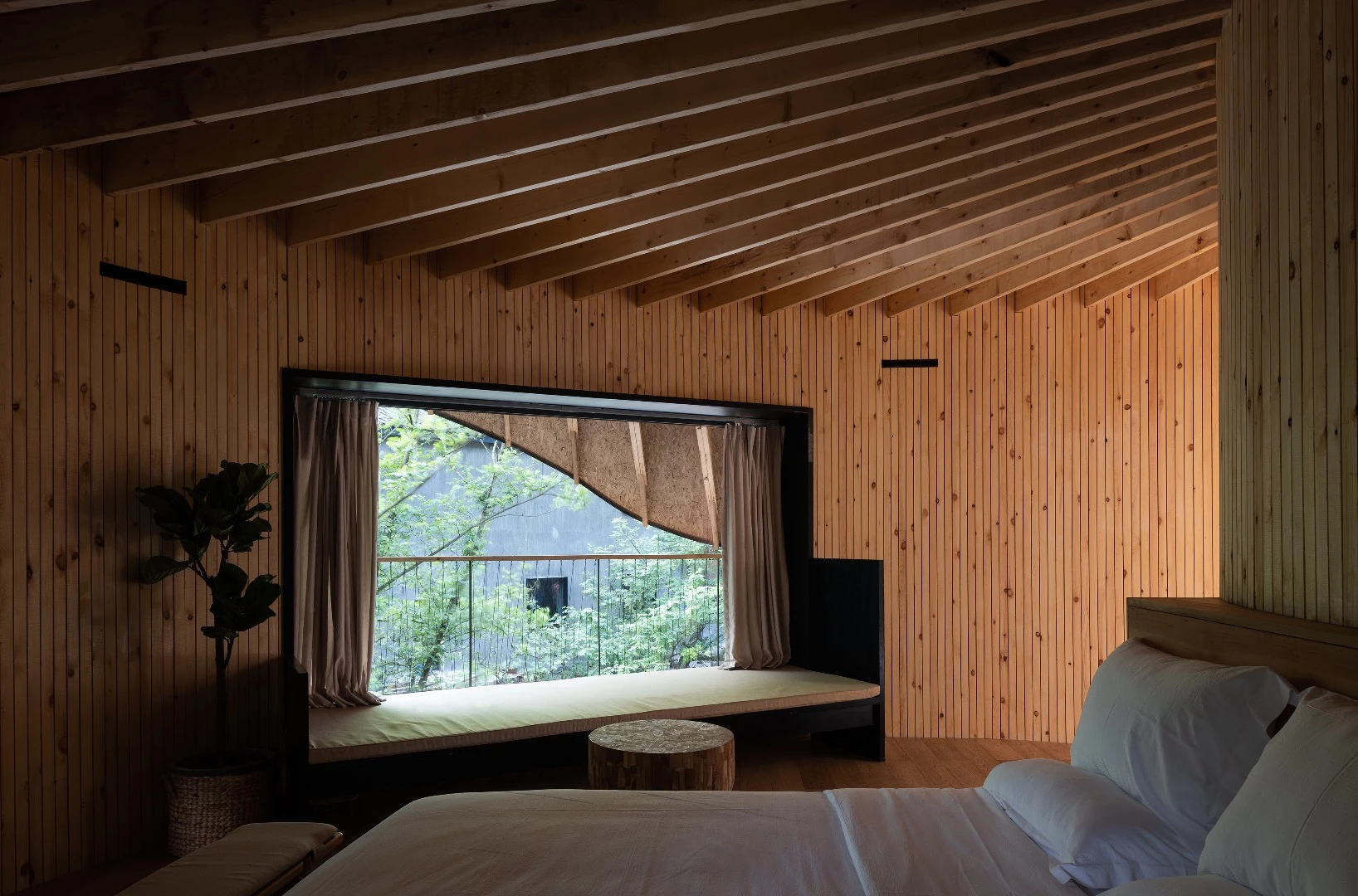 The interior includes a living room and bedroom