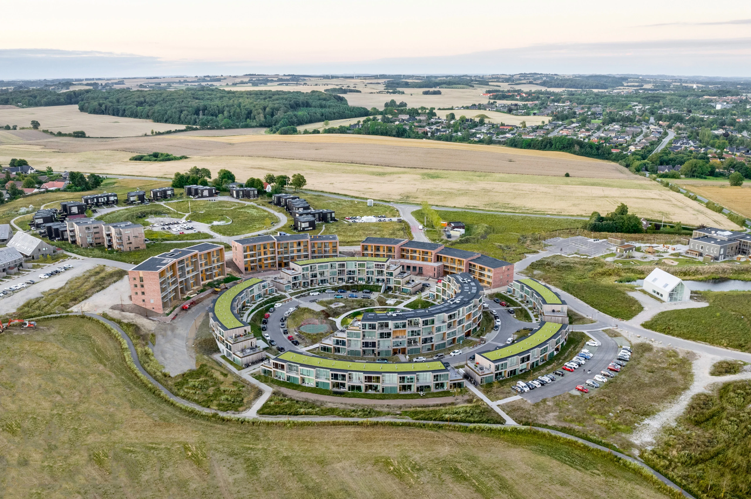 The Sneglehusene is located in Nye, a new neighborhood developed north of Denmark's second-largest city, Aarhu