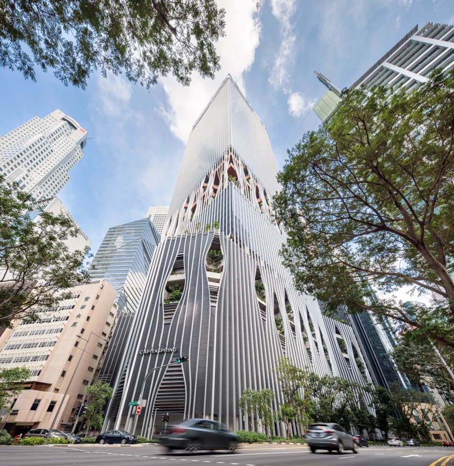 CapitaSpring reaches a height of 280 m (918 ft) over Singapore