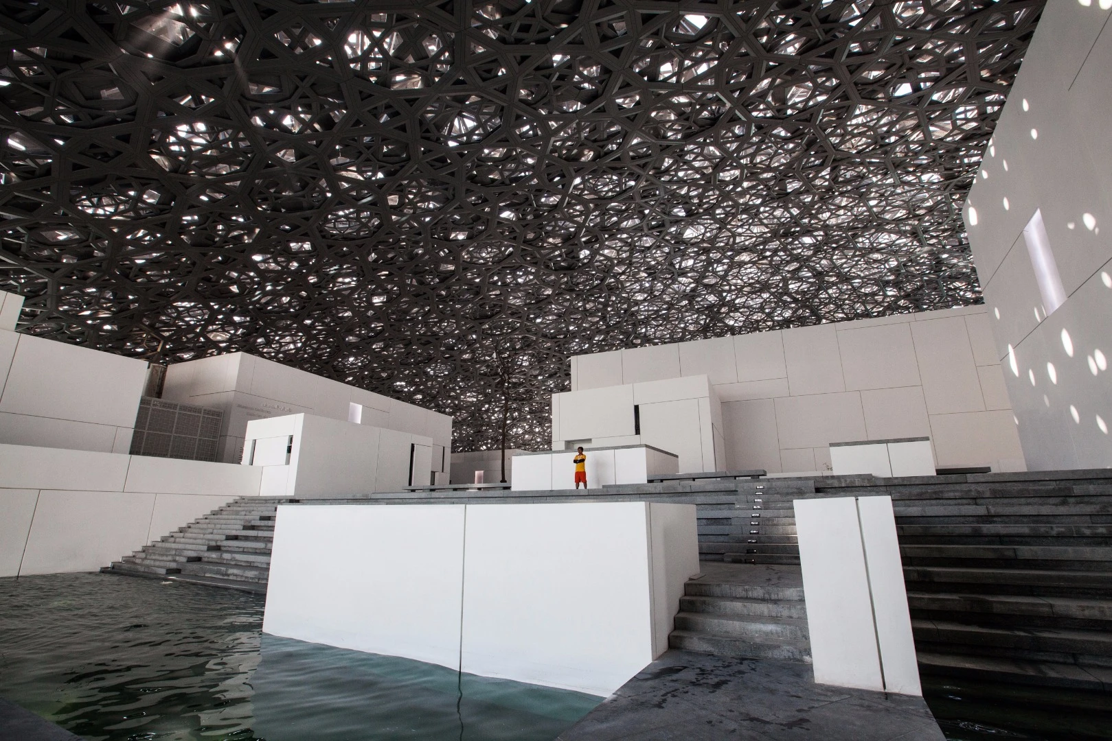 A lifeguard watches over the waters of the Louvre Abu Dhabi