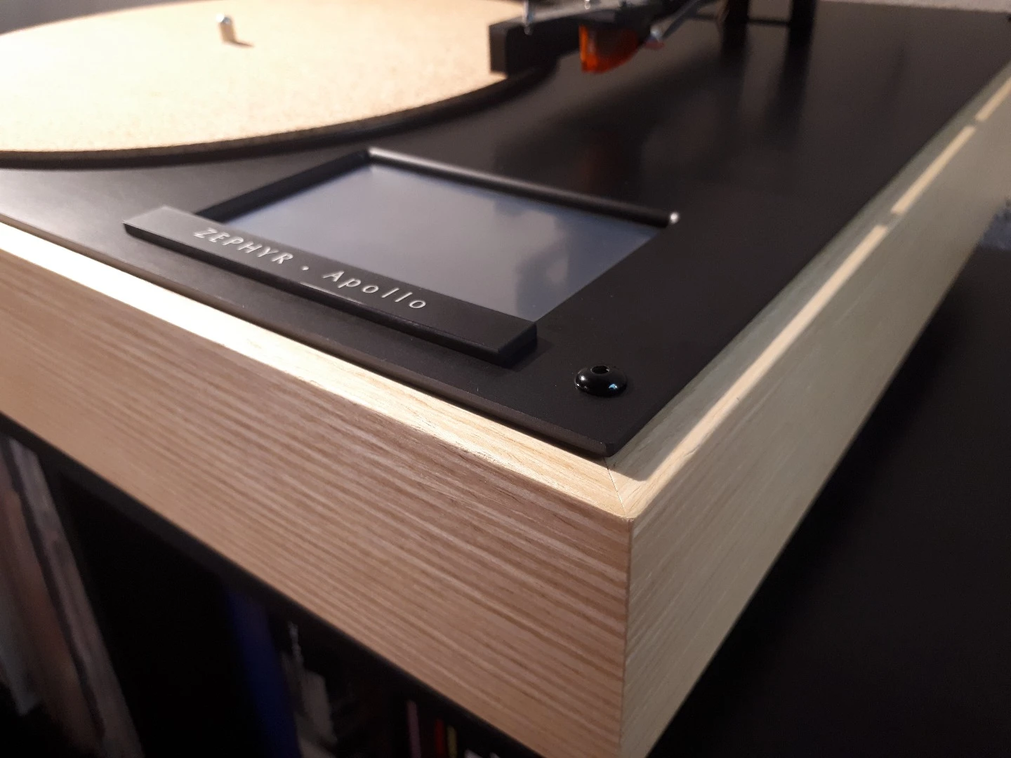 The Zephyr Apollo turntable is available in maple or walnut finish