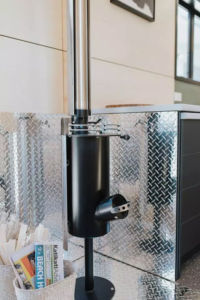 La Sombra Tiny House is heated with a mini wood-burning stove