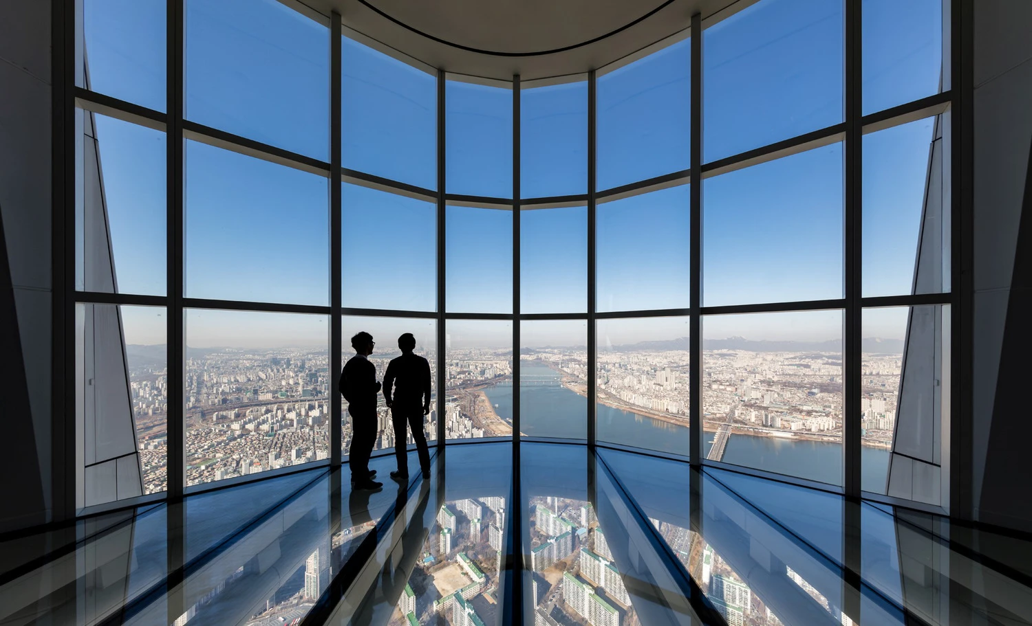The Lotte World Tower's glass-bottomed observation deck – the world's tallest at a height of 497.6 m (1,633 ft) – is reached by the world's fastest elevator
