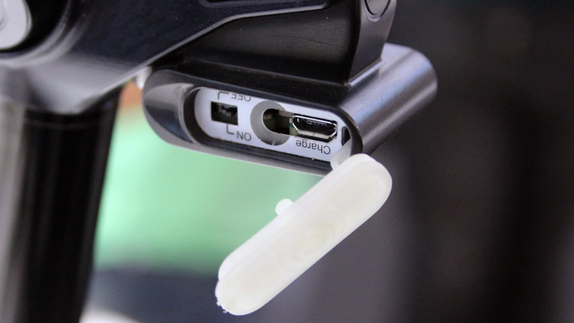 The Vyron seat post's covered power switch and charging port