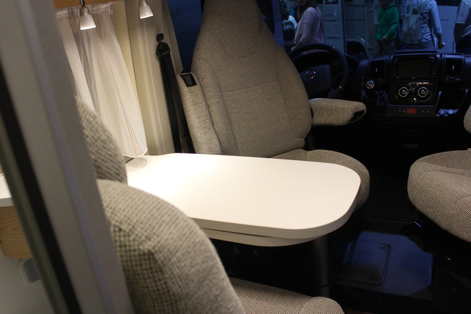 Swivel front seats work with the bench to create dining room seating