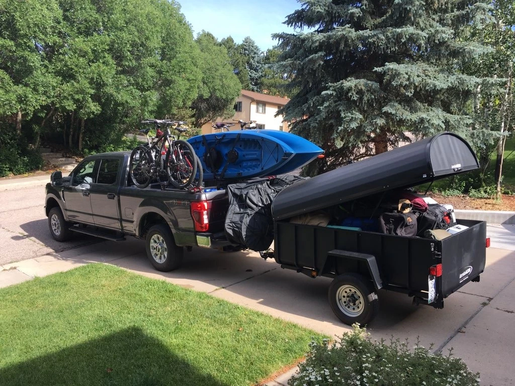 In addition to working as a wedge camper roof, the HexCap tonneu cover lets owners pile cargo higher in the LittleGiant or SpecOps trailer and provides security when closed and locked