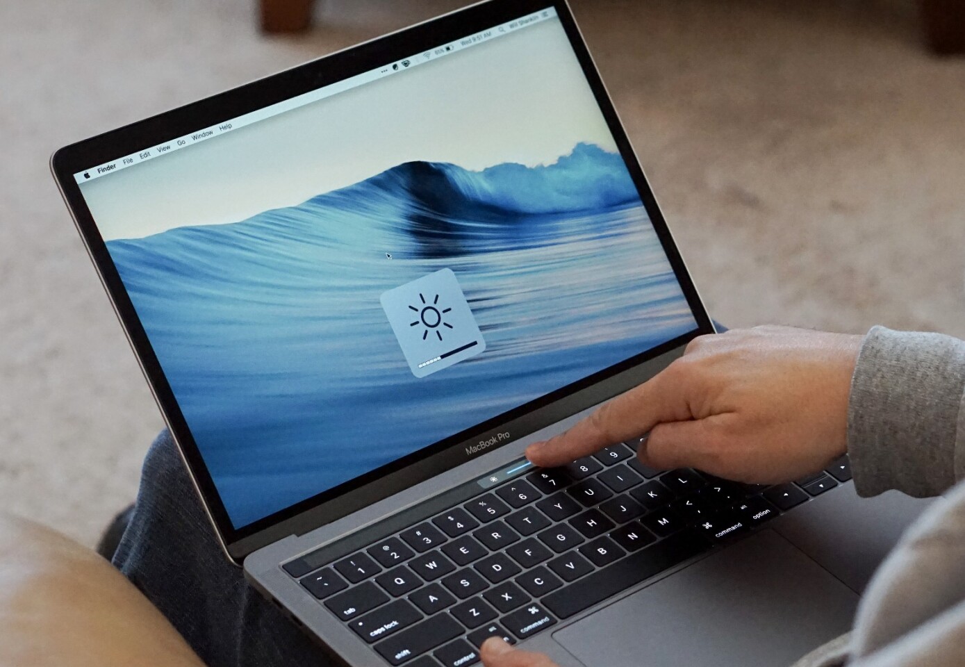 In apps that don't yet support the Touch Bar, you just see basic system settings like brightness