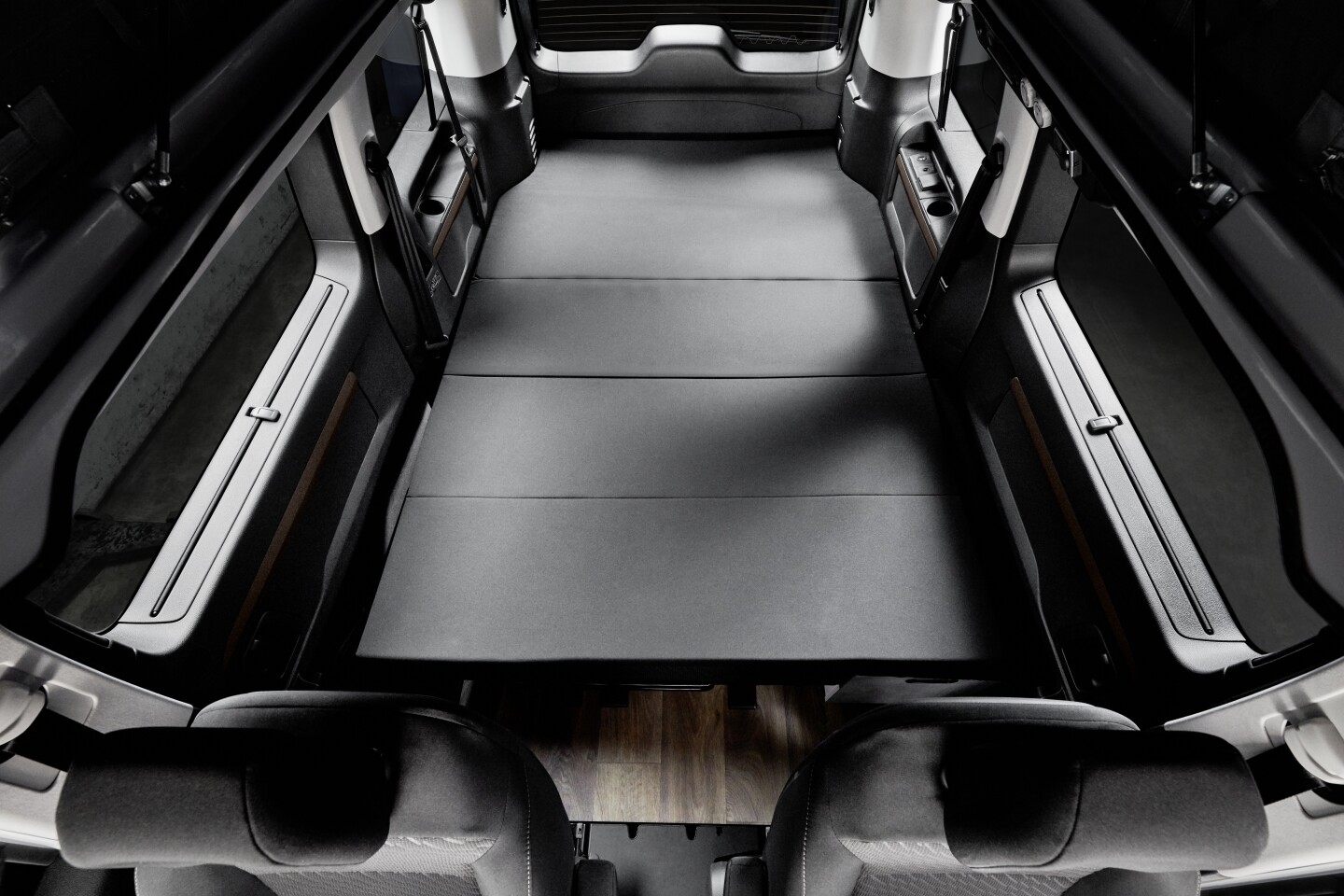By eliminating the side kitchen, Crosscamp makes room for a full-width bed