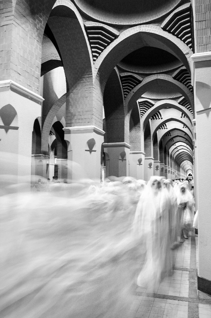 Women in white take part in an Islamic pilgrimage to Mecca, Saudi Arabia