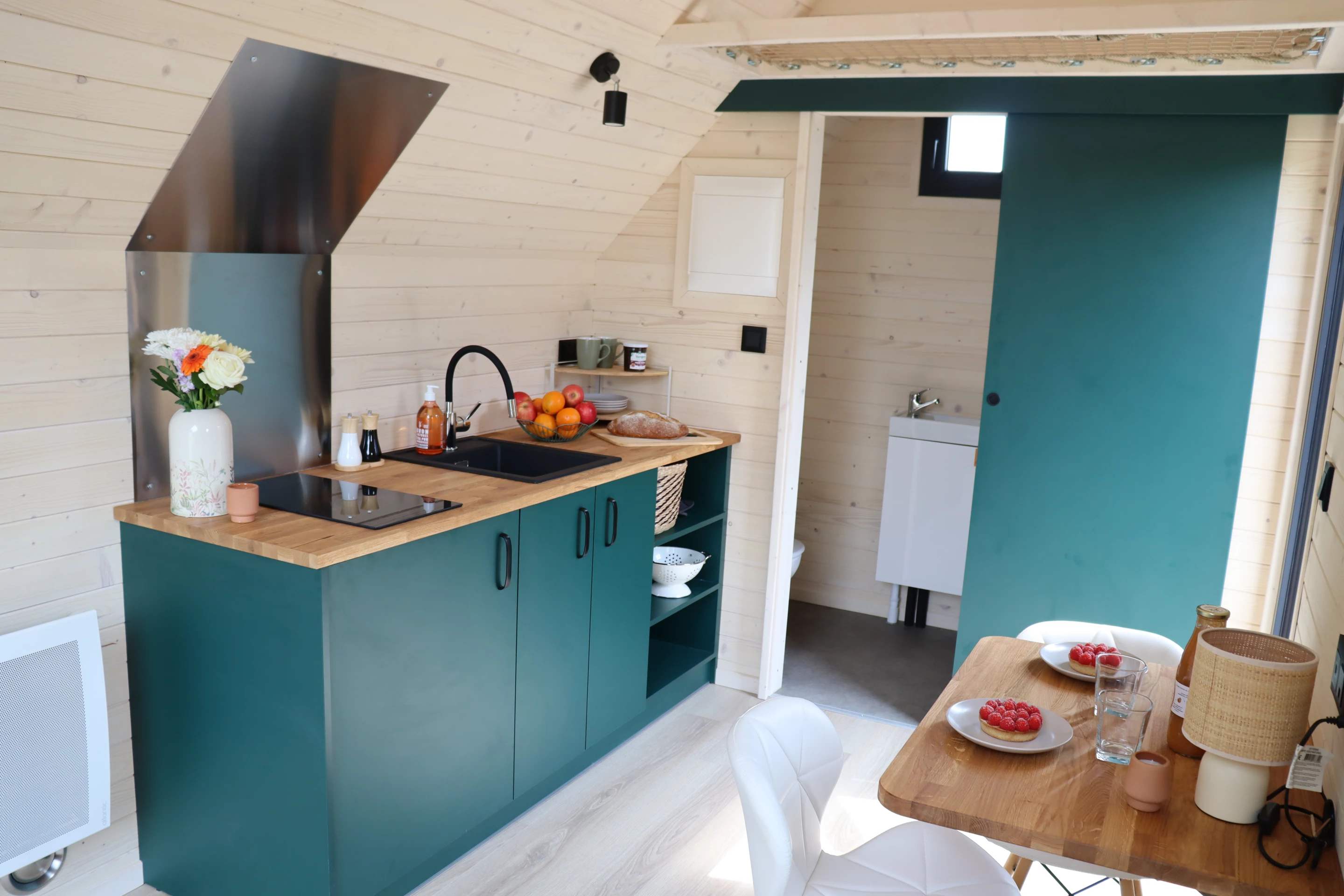 The Nid Luxe's kitchen is simple, reflecting its intended use as a vacation home